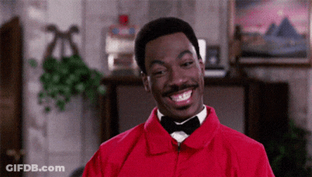 Man In Red Jacket And Bow Tie Smiling GIF