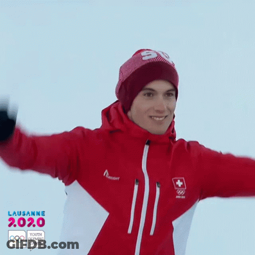 Man In Red Jacket And Red Beanie With Number 50 GIF