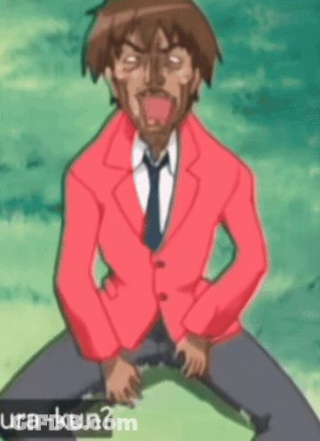 Man In Red Jacket And Tie Kneeling With Ura-Kun GIF