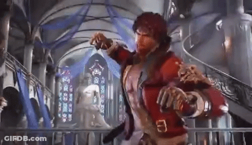 Man In Red Jacket By Stained Glass Window GIF