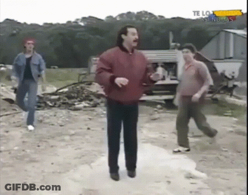 Man In Red Jacket Dancing In Front Of Te Lo As Nuevas Sign GIF