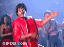 Man In Red Jacket Dancing On Stage GIF