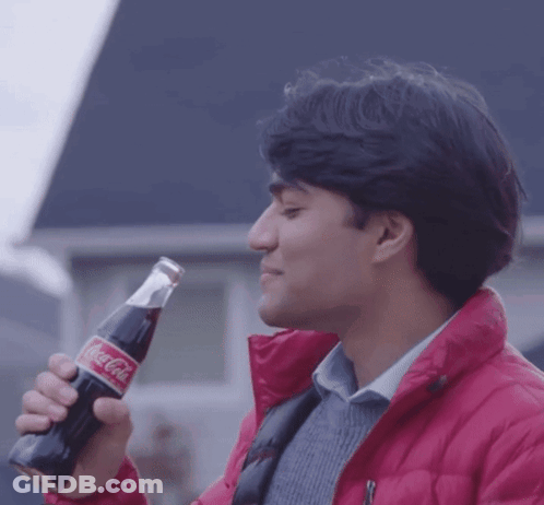 Man In Red Jacket Drinking Coca Cola GIF