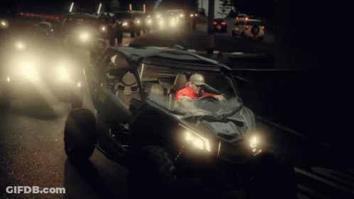 Man In Red Jacket Driving Buggy GIF