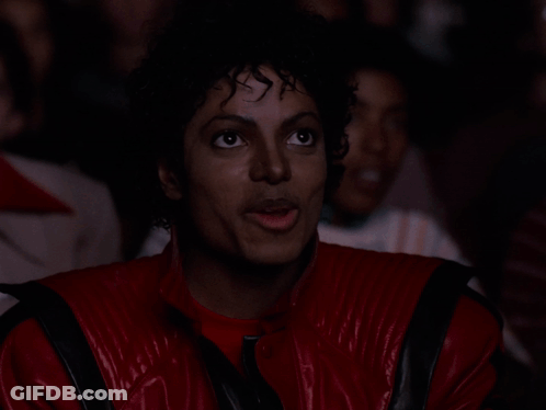 Man In Red Jacket Eating Marshmallow GIF
