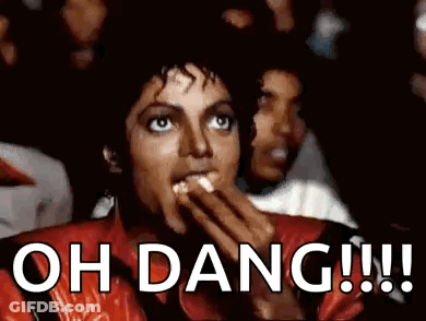 Man In Red Jacket Eating Popcorn Says Oh Dang GIF