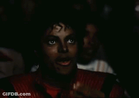 Man In Red Jacket Eating Popcorn Watching Movie GIF