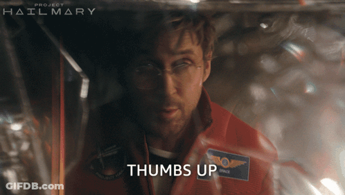 Man In Red Jacket Giving Thumbs Up Before Project Hail Mary Poster GIF