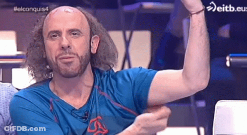 Man In Red Jacket Held By Another Person Eitb.com GIF