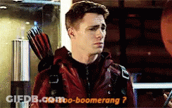 Man In Red Jacket Holding Arrow Says Ka-Boo-Boomerang GIF