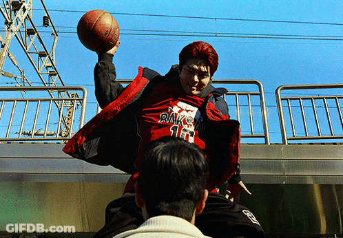 Man In Red Jacket Holding Basketball GIF