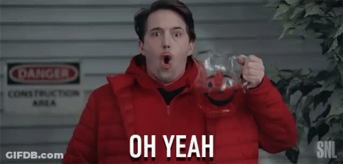 Man In Red Jacket Holding Kettle Corn GIF