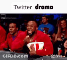 Man In Red Jacket Holding Popcorn Screaming At Twitter Drama GIF