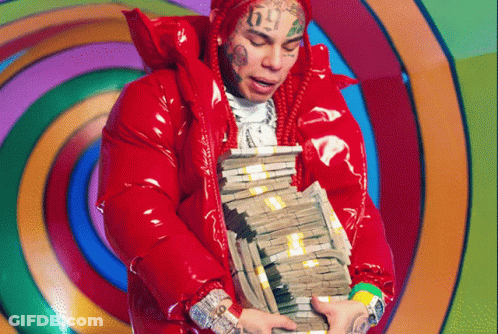 Man In Red Jacket Holding Stack Of Money GIF