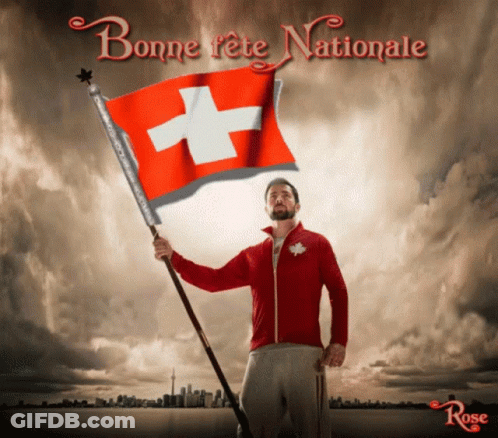 Man In Red Jacket Holding Swiss Flag GIF