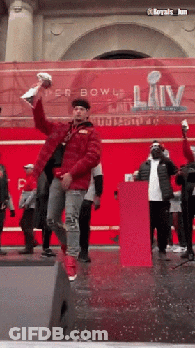 Man In Red Jacket Holding Trophy Super Bowl LIV GIF