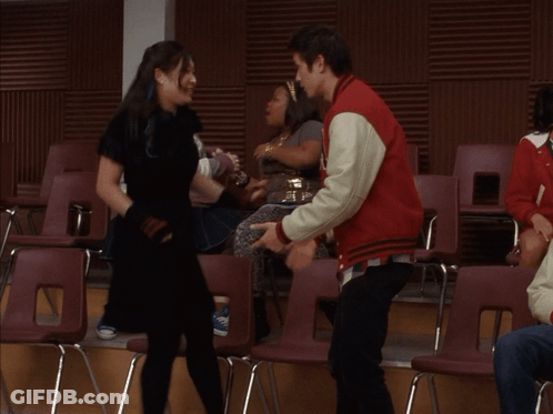Man In Red Jacket Holding Woman's Hand GIF