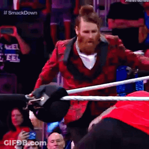 Man In Red Jacket In Wrestling Ring GIF