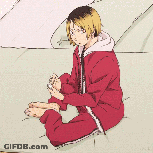 Man In Red Jacket Looking At Cell Phone GIF