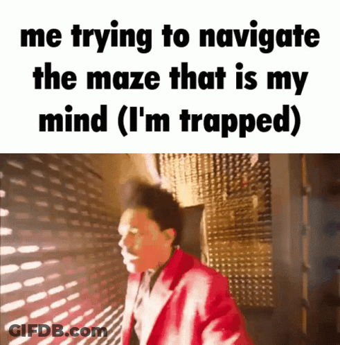 Man In Red Jacket Navigating Maze That Is My Mind GIF