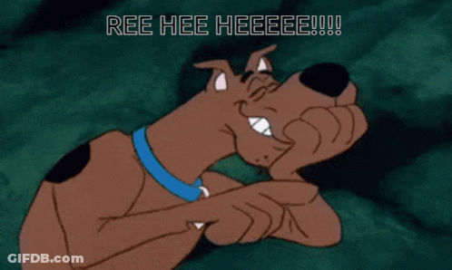 Man In Red Jacket Next To Mickey Mouse Costume GIF