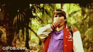 Man In Red Jacket Number 5 Covering Mouth GIF