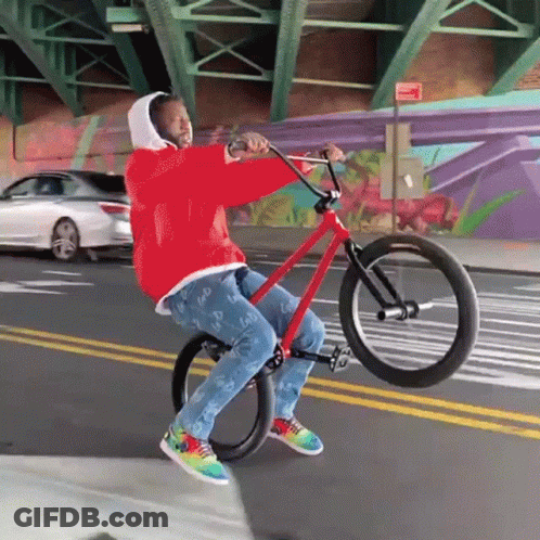 Man In Red Jacket Riding Red Bicycle GIF