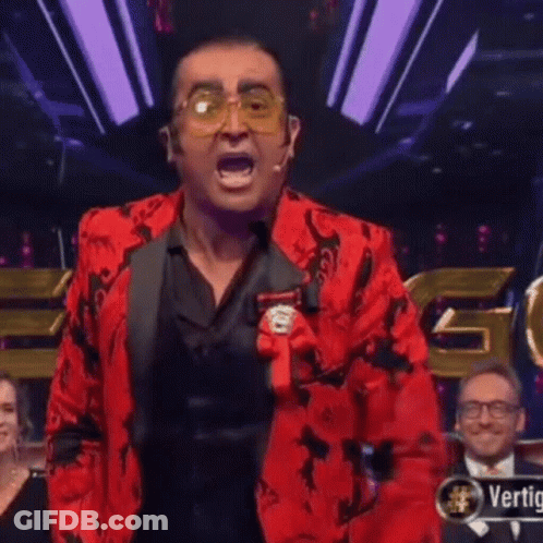 Man In Red Jacket Saying Toma Cachito E Gomajig GIF
