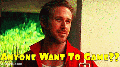 Man In Red Jacket Says Anyone Want To Game GIF