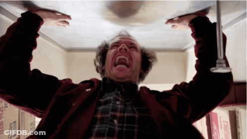 Man In Red Jacket Screaming Looking Up At Boxes 0129 GIF