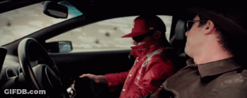 Man In Red Jacket Sitting In Car GIF