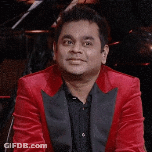 Man In Red Jacket Smiling GIF