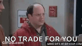 Man In Red Jacket Standing Before Fire Alarm GIF