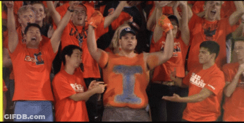 Man In Red Jacket Standing Next To Another Man GIF