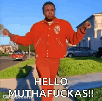 Man In Red Jacket Walking With Arms Outstretched Says Hello Muthafuckas GIF