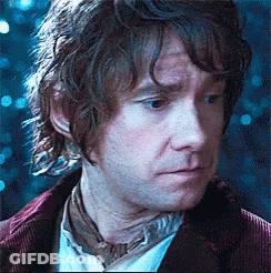 Man In Red Jacket With Blue Background GIF