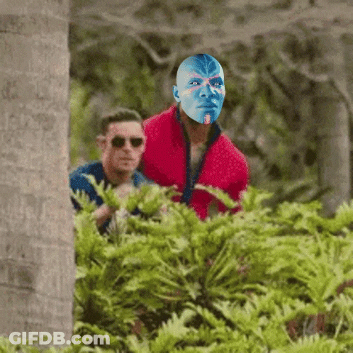 Man In Red Jacket With Blue Painted Face GIF