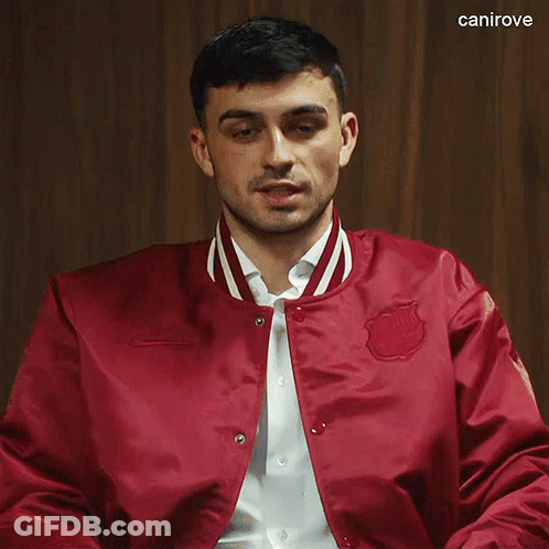 Man In Red Jacket With Canirove GIF