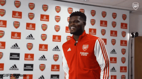 Man In Red Jacket With Emirates Fly Emirates GIF