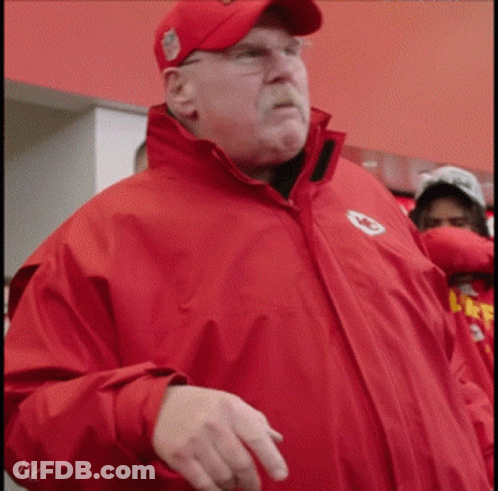 Man In Red Jacket With HK Logo GIF