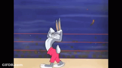 Man In Red Jacket With Letter A Kneeling GIF