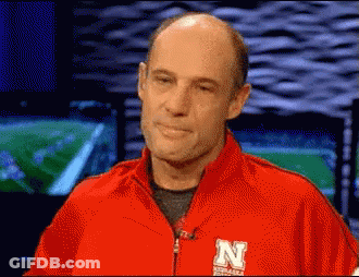 Man In Red Jacket With Letter N GIF