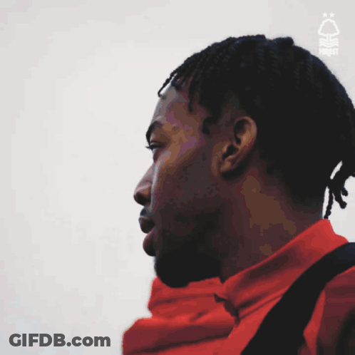 Man In Red Jacket With Logo GIF