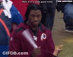 Man In Red Jacket With Redskins Logo GIF