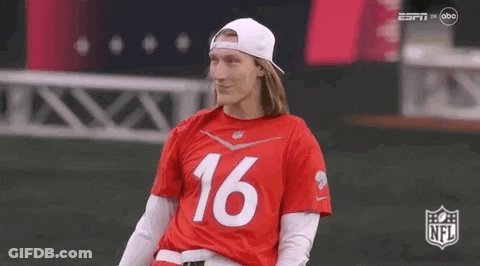 Man In Red Jersey And White Hat Sitting On Field GIF