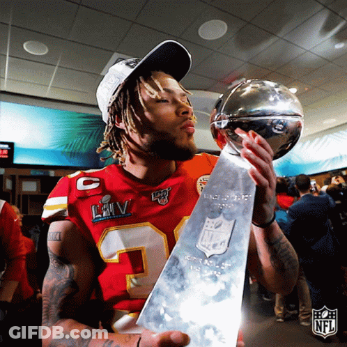 Man In Red Jersey Kissing Trophy GIF