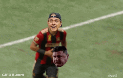 Man In Red Jersey Number 4 Running On Soccer Field GIF