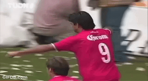 Man In Red Jersey Playing Soccer GIF