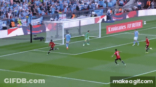 Man In Red Jersey Running Soccer Field GIF