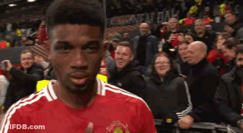 Man In Red Jersey Saying Manchester GIF